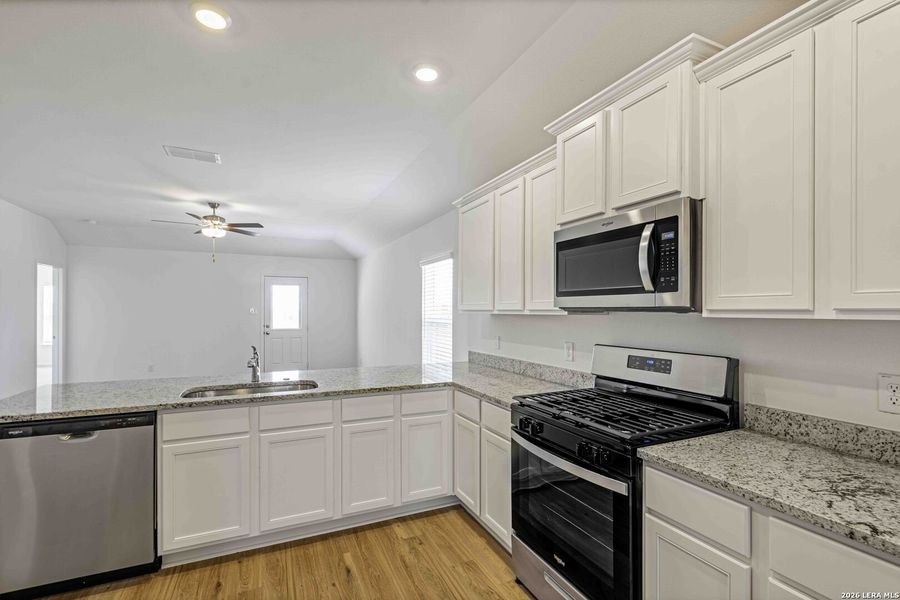 Furnished interior view inside a new home in , San Antonio (Image 8).