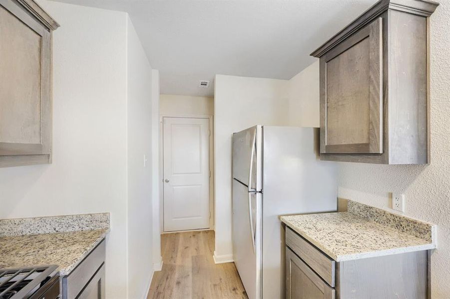 Furnished interior view inside a new home in Patriot Estates, Venus (Image 8).