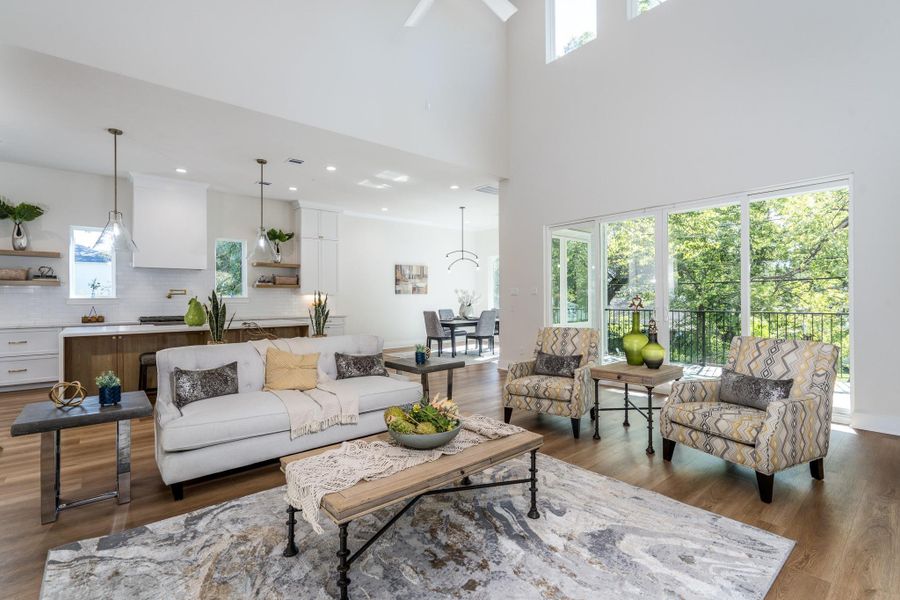 Expansive living room with high ceilings, premium finishes, and a bright open-concept design. This space offers the perfect balance of style and comfort for everyday living and hosting. Expansive living room with high ceilings, premium finishes, and a bright open-concept design. This space offers the perfect balance of style and comfort for everyday living and hosting.