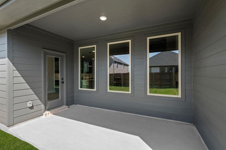 Exterior details and patio area of a home in Rocky Creek Crossing, Crowley (Image 4).