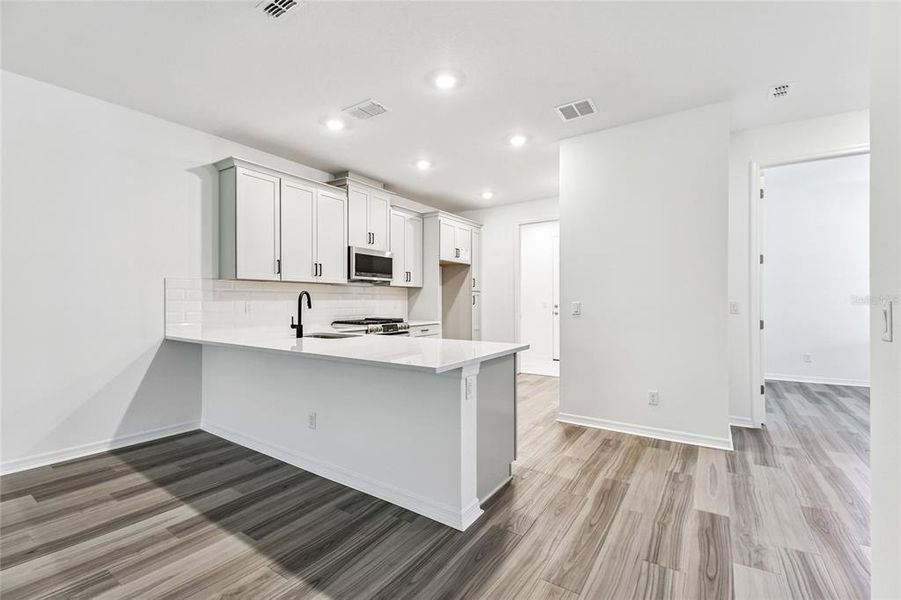Furnished interior view inside a new home in Sweetwater at Lakewood Ranch, Lakewood Ranch (Image 9).