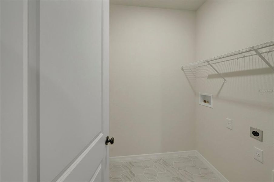 Spacious, unfurnished interior of a new home in Waterset Tradition Series, Apollo Beach (Image 22).