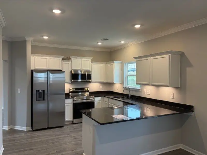 Furnished interior view inside a new home in Cumberland Estates, Fairview (Image 3). Furnished interior view inside a new home in Cumberland Estates, Fairview (Image 3).