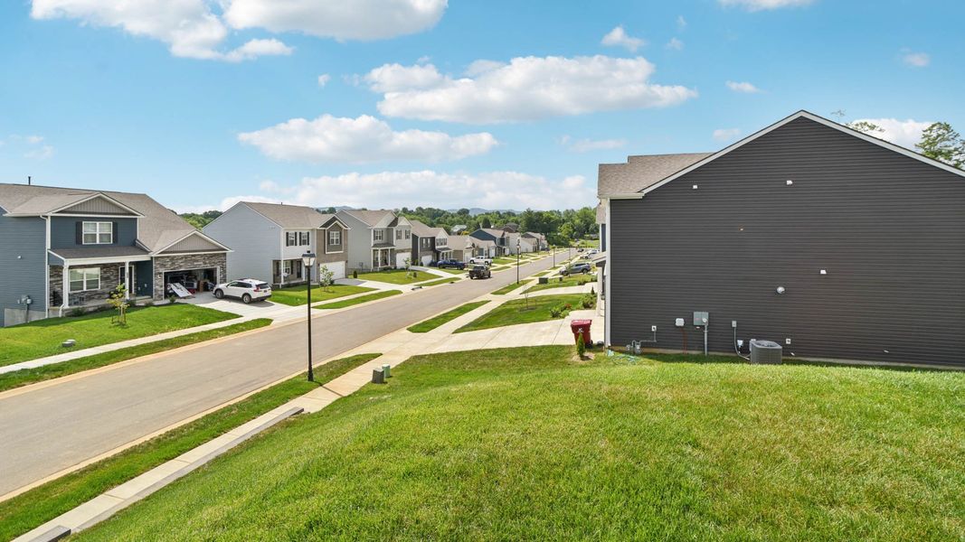 Representative exterior photo of a completed home built from the Craig by D.R. Horton in The Hideaway at Fox Meadows, Bluff City, TN (Image 23).