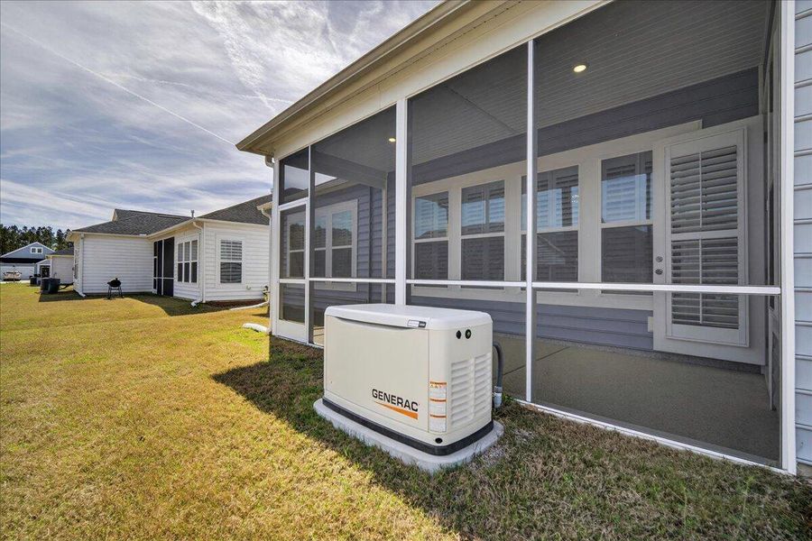 Exterior details and patio area of a home in Horizons at Summers Corner | 55+, Summerville (Image 19).