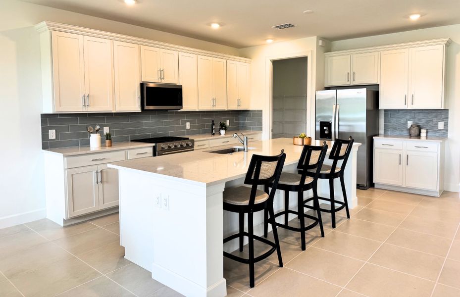 Furnished interior view inside a new home in Arbor Oaks, North Port (Image 17).