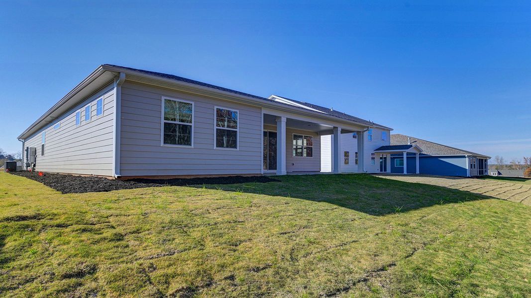 Exterior details and patio area of a home in Livingston Woods, Irmo (Image 4).