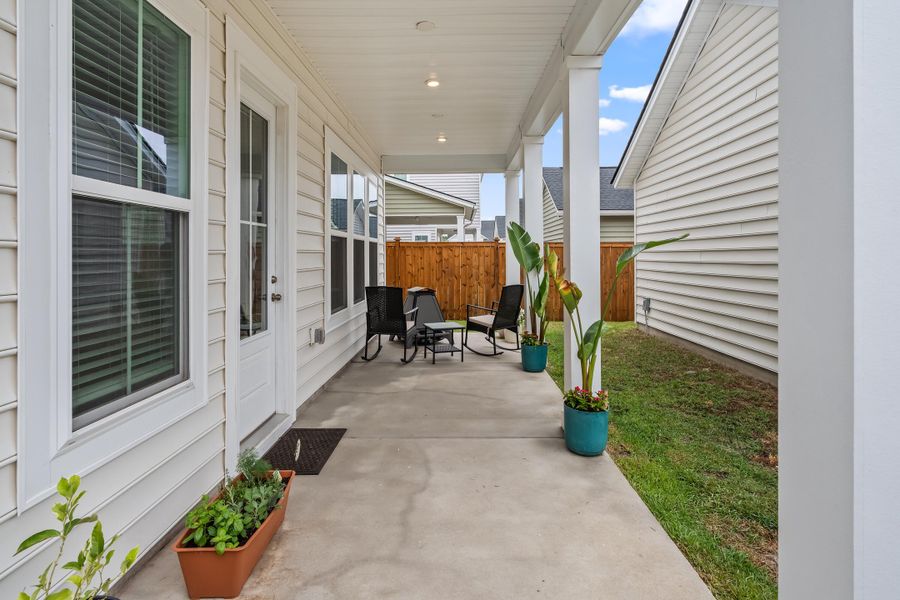 Exterior details and patio area of a home in Sweetgrass at Summers Corner, Summerville (Image 27).