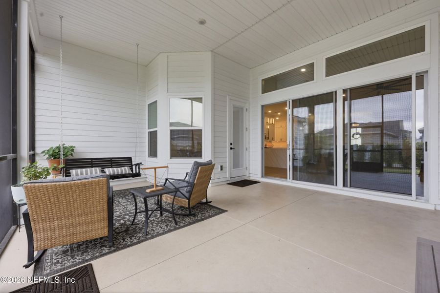 Exterior details and patio area of a home in Seven Pines 70' Rear Entry, Jacksonville (Image 35).