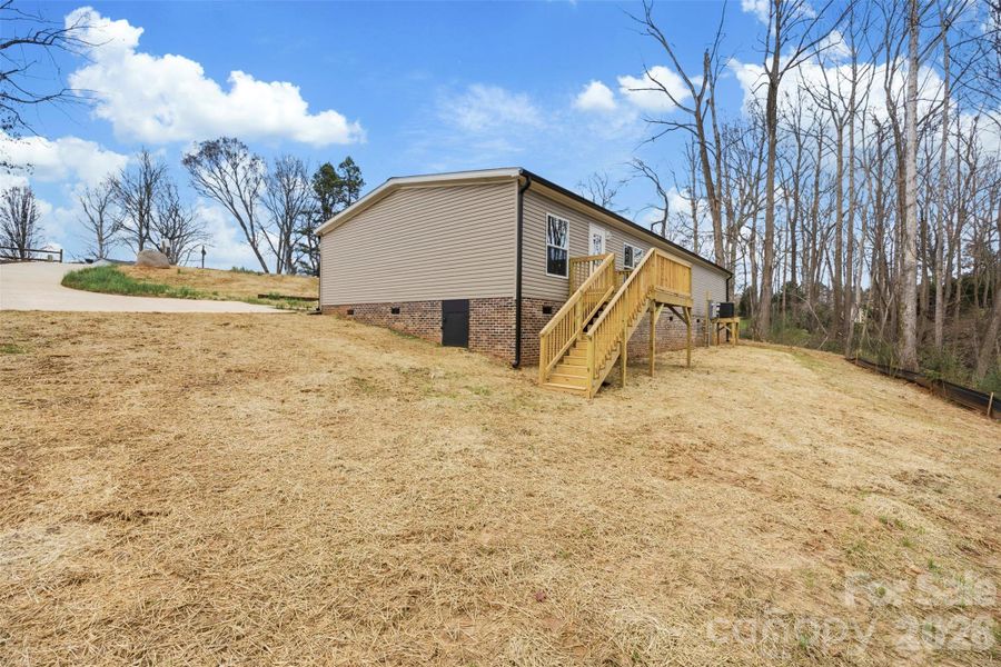 Exterior details and patio area of a home in , Mooresville (Image 20).