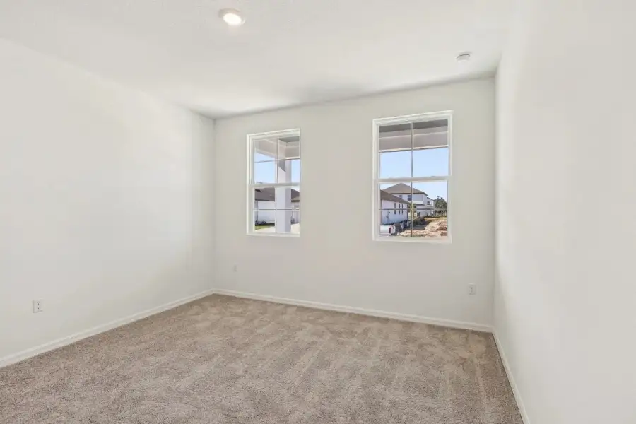 Spacious, unfurnished interior of a new home in Northlake at Ovation, Winter Garden (Image 22).