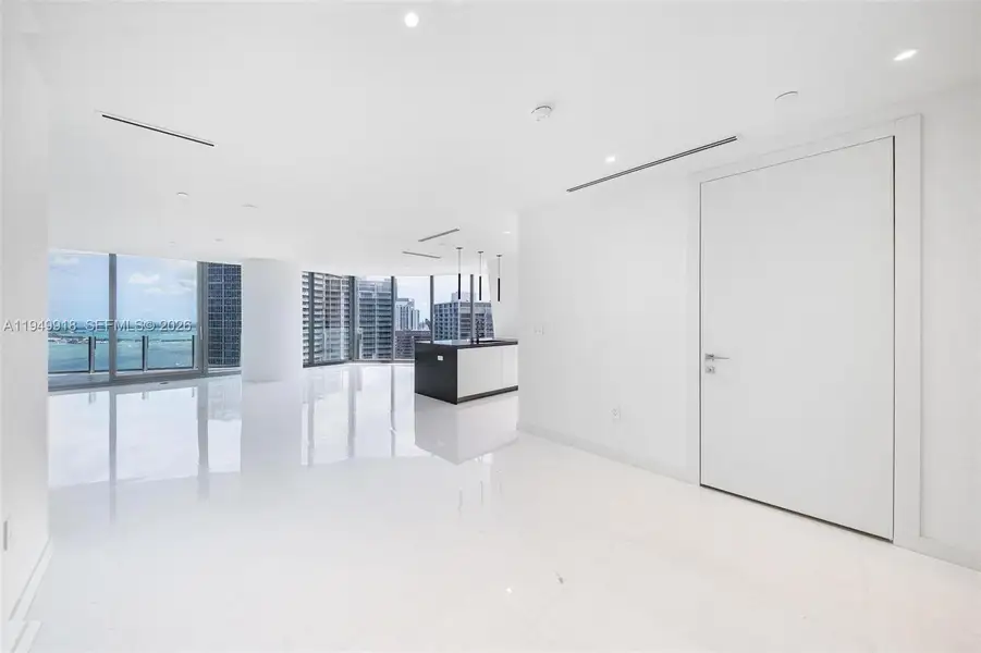 Spacious, unfurnished interior of a new home in Aston Martin Residences, Miami (Image 24).