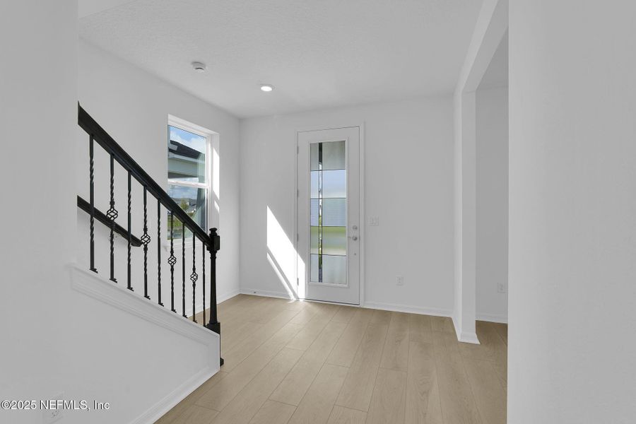 Spacious, unfurnished interior of a new home in Hawthorn Park at Wildlight, Yulee (Image 17).