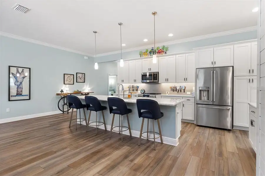 Furnished interior view inside a new home in , The Villages (Image 17).