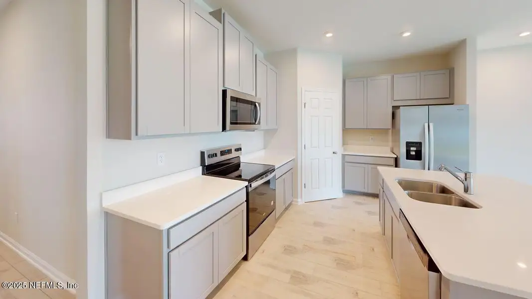 Furnished interior view inside a new home in Sandridge Hills, Green Cove Springs (Image 6).