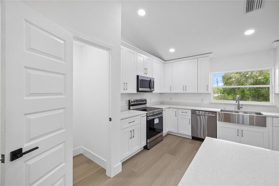 Furnished interior view inside a new home in , Dunnellon (Image 10).