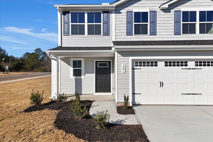 Front exterior of a new home in Wren Woods 2-Story, Gray Court, SC, highlighting curb appeal (Image 2).
