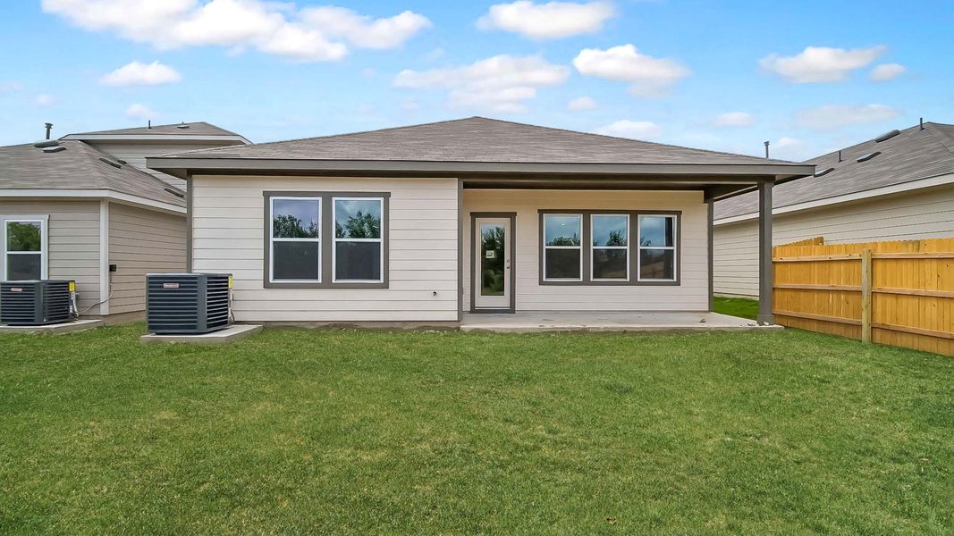 Exterior details and patio area of a home in Prairie Lakes, Buda (Image 4).
