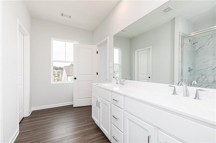 Furnished interior view inside a new home in Madison at Buice Lake, Acworth (Image 6). Furnished interior view inside a new home in Madison at Buice Lake, Acworth (Image 6).