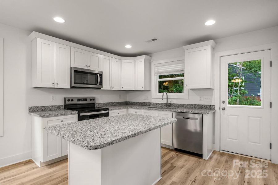 Furnished interior view inside a new home in , Albemarle (Image 10).