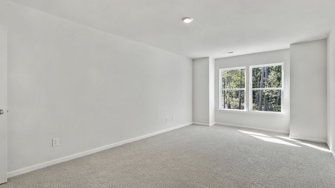 Spacious, unfurnished interior of a new home in Copper Run South, Durham (Image 18).