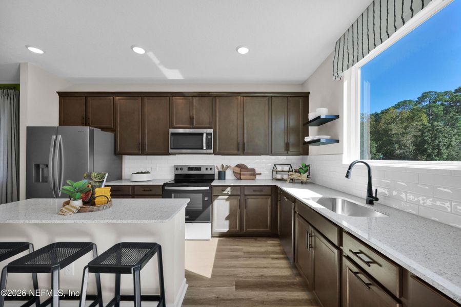 Furnished interior view inside a new home in Baxley Villas, Middleburg (Image 14).