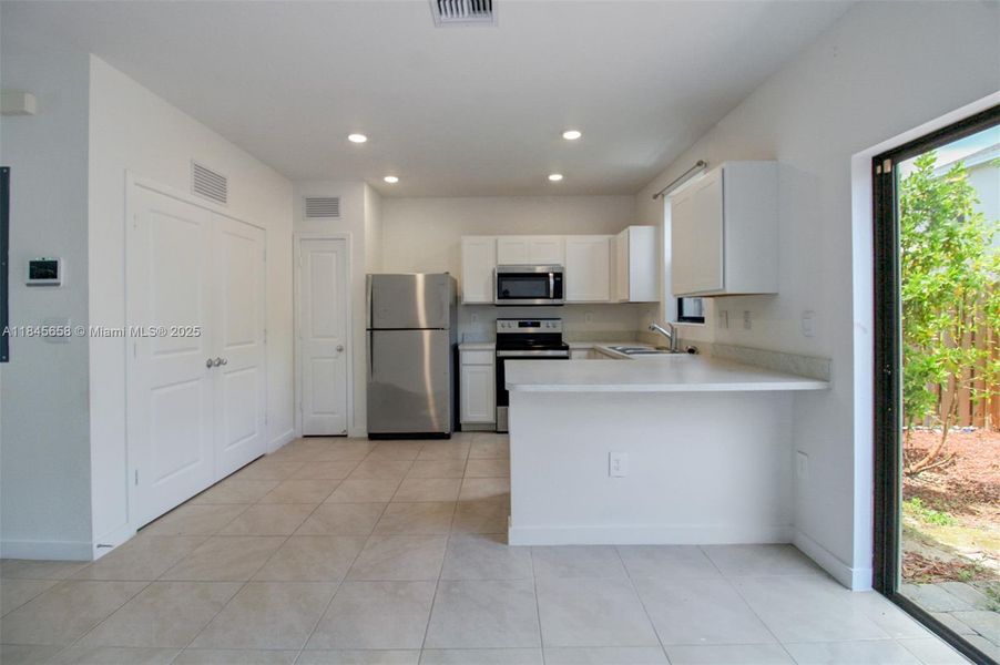 Furnished interior view inside a new home in , Florida City (Image 5).
