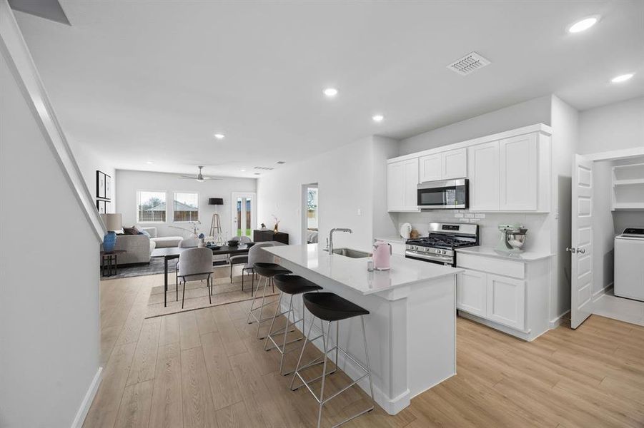 Open First Floor in the Mesquite home plan by Trophy Signature Homes – REPRESENTATIVE PHOTO Open First Floor in the Mesquite home plan by Trophy Signature Homes – REPRESENTATIVE PHOTO