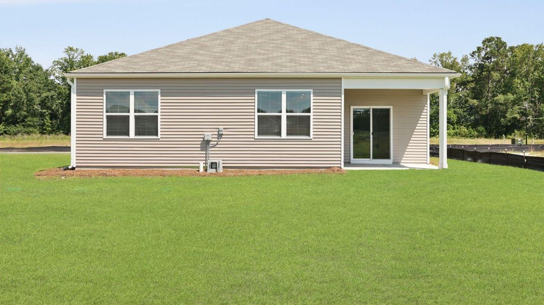 Front exterior of a new home in The Ranch, Holly Hill, SC, highlighting curb appeal (Image 2).