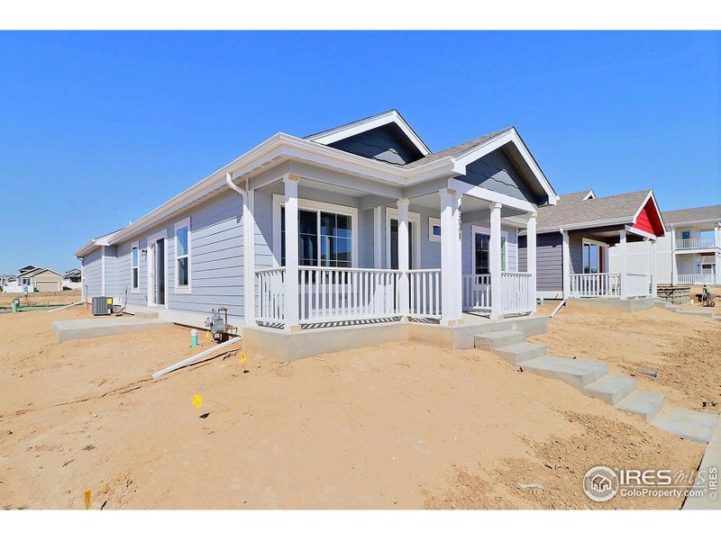 Front exterior of a new home in , Evans, CO, highlighting curb appeal (Image 17). Front exterior of a new home in , Evans, CO, highlighting curb appeal (Image 17).