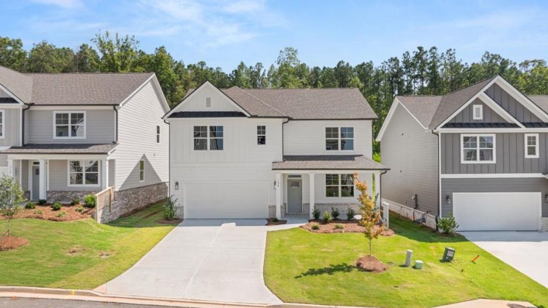 Front exterior of a new home in Hamptons at Riverwood South, Dallas, GA, highlighting curb appeal (Image 2). Front exterior of a new home in Hamptons at Riverwood South, Dallas, GA, highlighting curb appeal (Image 2).