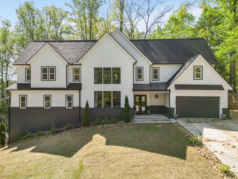 Front exterior of a new home in , Atlanta, GA, highlighting curb appeal (Image 25).