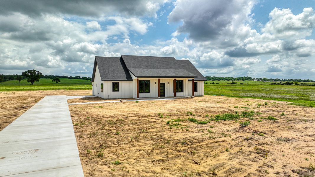 Representative exterior photo of a completed home built from the Magnolia by Zeal Home Builders in Horizon Meadow Estates, Paradise, TX (Image 28).