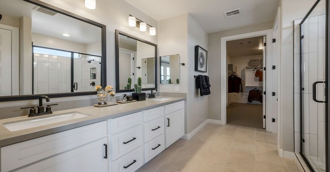 Representative furnished interior of a home built from the Camelback by William Ryan Homes in Alta Vida at Westpark, Buckeye (Image 19).