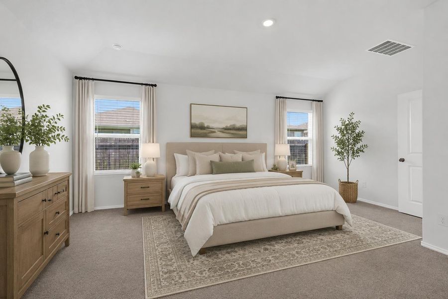 Well-lit sleeping quarters with plush carpeting and ample natural illumination.
