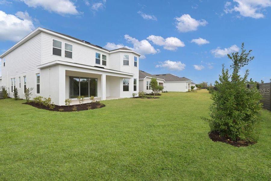 Exterior details and patio area of a home in Firethorn, Parrish (Image 29).