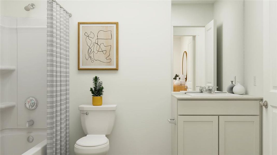 Full bathroom featuring vanity, toilet, and shower / bathtub combination with curtain