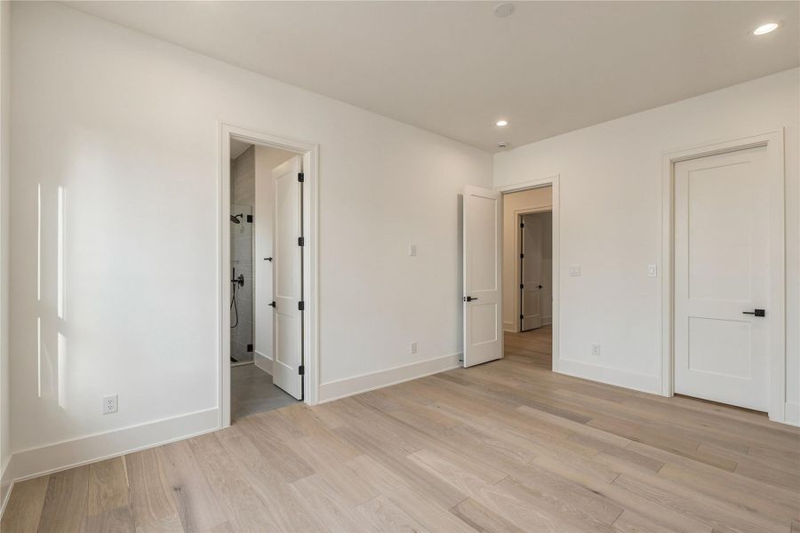 Another generously sized secondary bedroom offers excellent flexibility for guests or family, with a clean, open layout ready to be personalized.