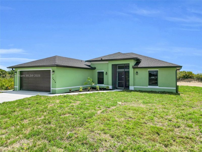 Front exterior of a new home in , Labelle, FL, highlighting curb appeal (Image 20). Front exterior of a new home in , Labelle, FL, highlighting curb appeal (Image 20).