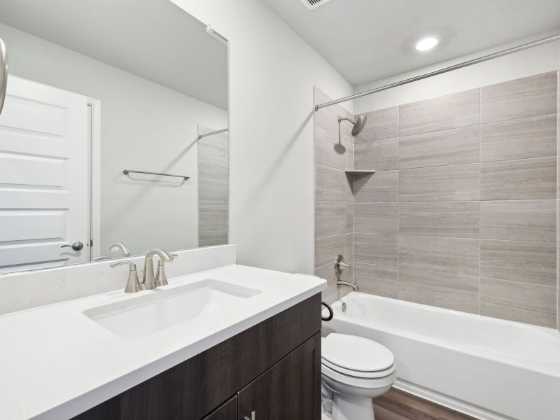 Furnished interior view inside a new home in Riverbend at Double Eagle - Boulevard Collection, Cedar Creek (Image 5).