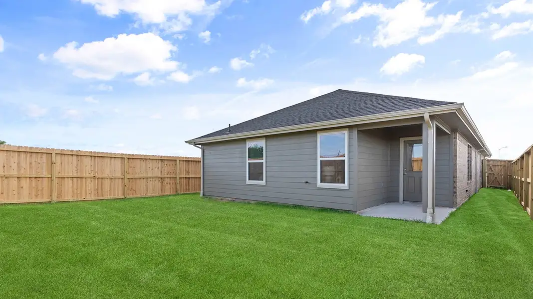 Exterior details and patio area of a home in Lakes at Westland Ranch, League City (Image 2).