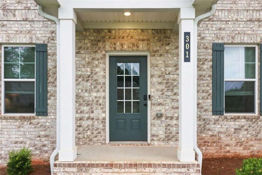Exterior details and patio area of a home in Trinity Park, McDonough (Image 3).