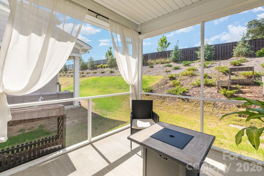 Exterior details and patio area of a home in Village at North Reach, Charlotte (Image 28).