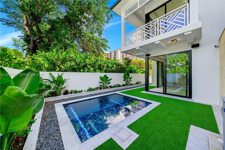 Exterior details and patio area of a home in , Coral Gables (Image 4). Exterior details and patio area of a home in , Coral Gables (Image 4).