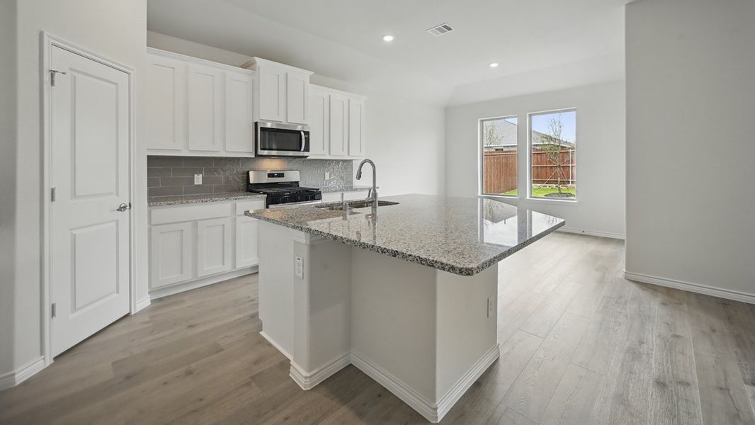 Representative furnished interior of a home built from the Ferry by D.R. Horton in The Woods at Lindsey Place, Anna (Image 6). Representative furnished interior of a home built from the Ferry by D.R. Horton in The Woods at Lindsey Place, Anna (Image 6).