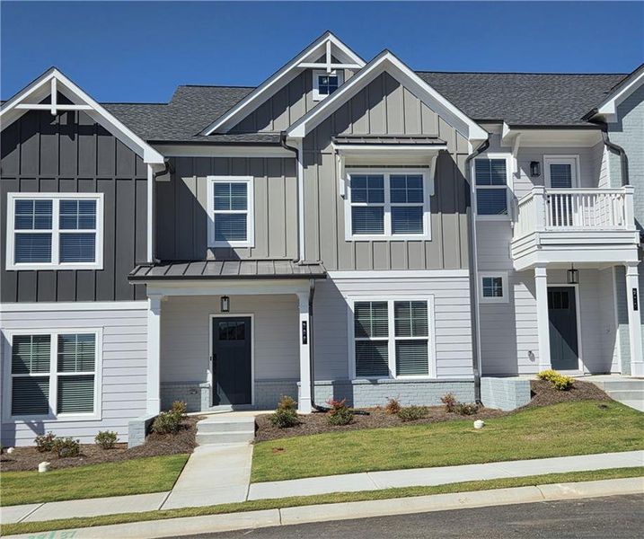 Front exterior of a new home in Apalachee Overlook, Bethlehem, GA, highlighting curb appeal (Image 1). Front exterior of a new home in Apalachee Overlook, Bethlehem, GA, highlighting curb appeal (Image 1).