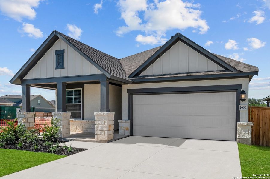 Front exterior of a new home in Ladera - High Point 45', San Antonio, TX, highlighting curb appeal (Image 1). Front exterior of a new home in Ladera - High Point 45', San Antonio, TX, highlighting curb appeal (Image 1).