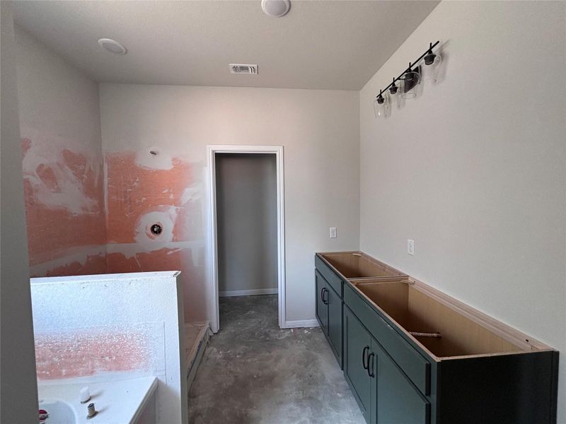 In-progress construction of a new home in The Colony, Bastrop, TX (Image 24).