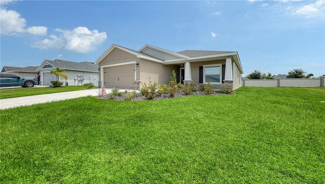 Front exterior of a new home in , Palmetto, FL, highlighting curb appeal (Image 24).