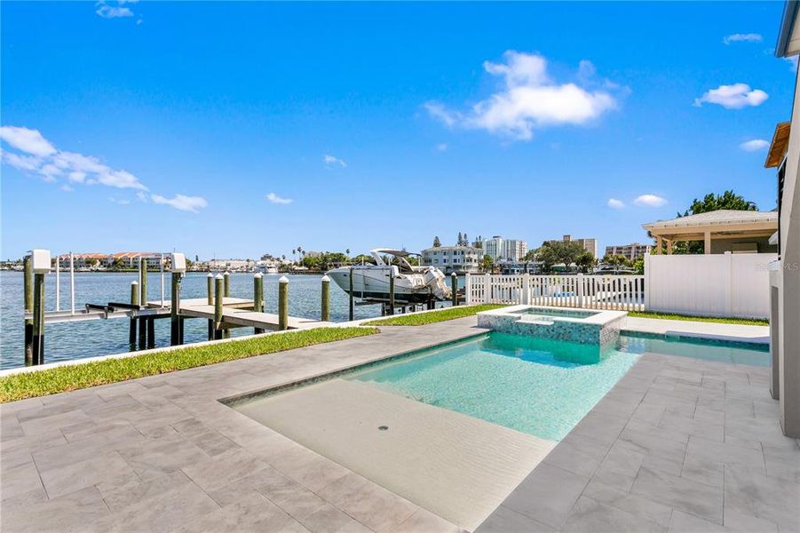 New pool and hot tub overlooking  new composite dock and 13,000 lb. lift and Boca Ciega Bay